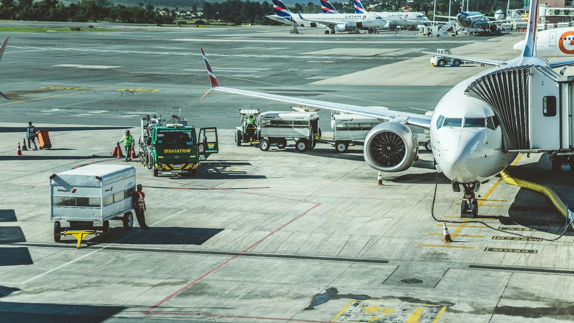 Ground crew working at airport tarmac — 24/7 operations