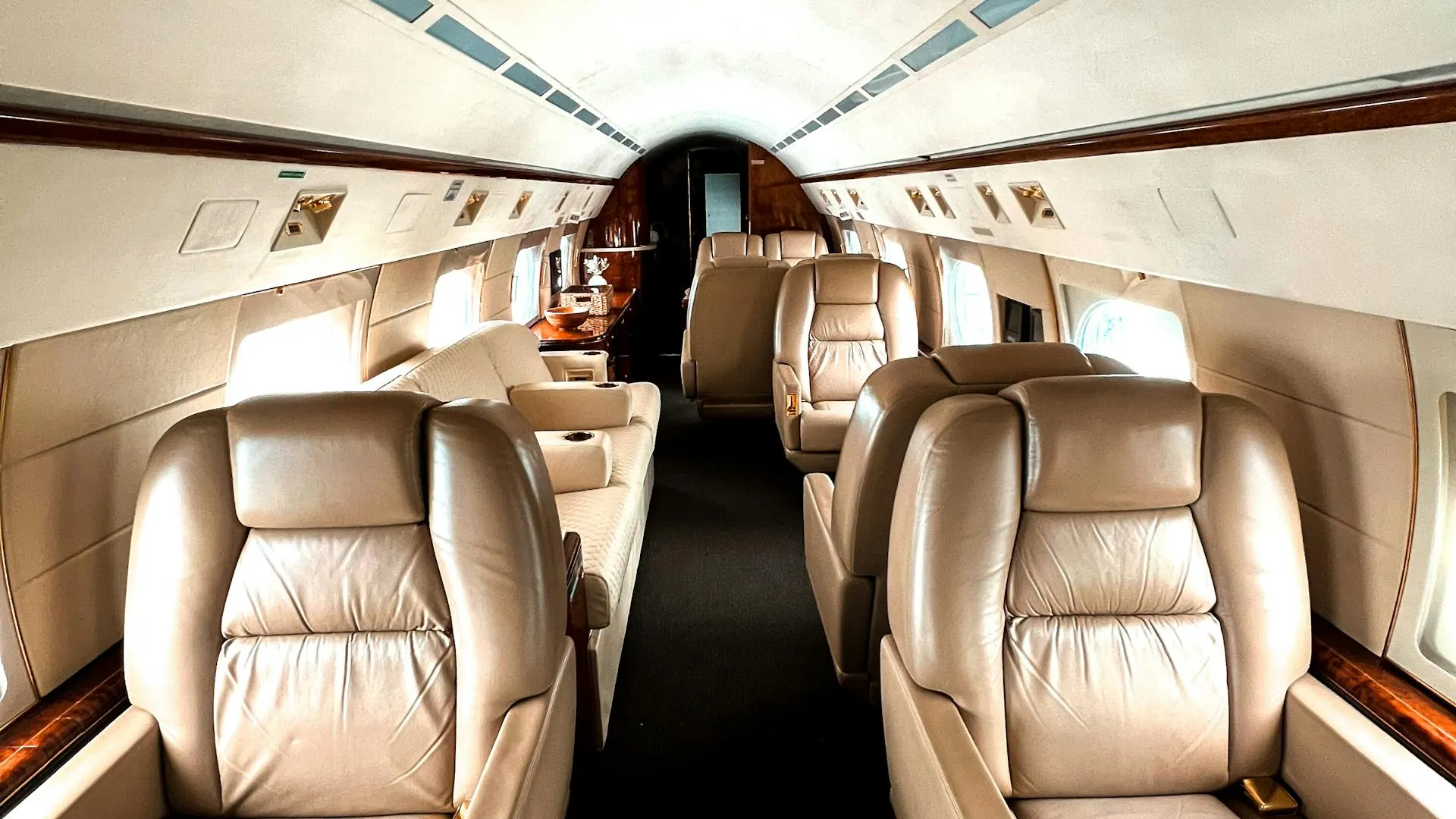Luxury private jet cabin interior — bespoke executive service